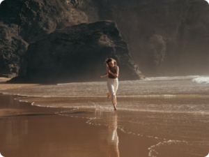 A woman running at the beach