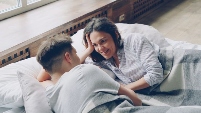 couple talking in bed